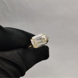 East West bezel set Moissanite ring size 6